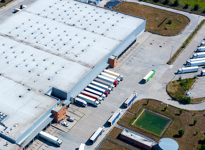 large warehouse with trucks