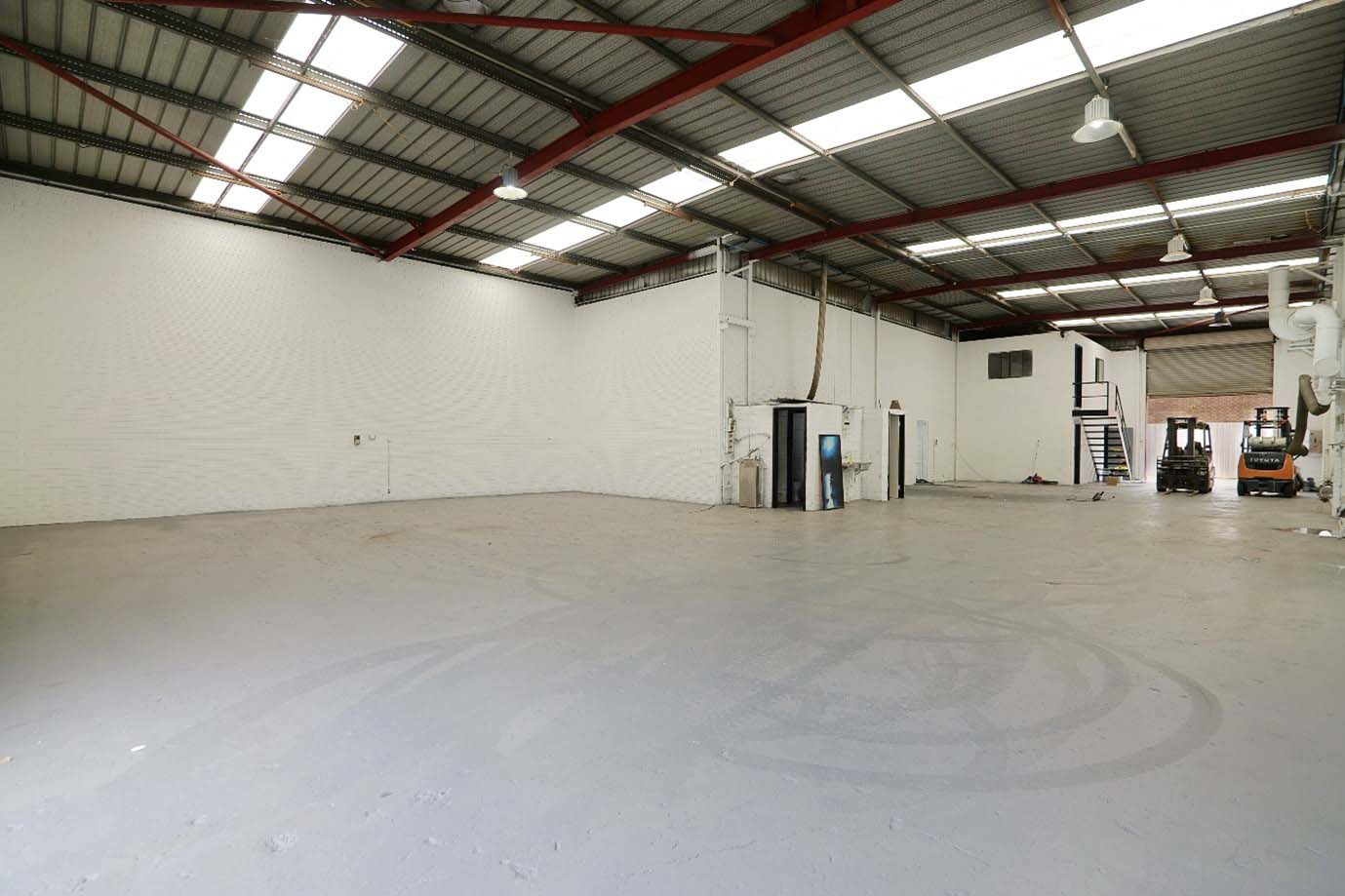 Interior of a warehouse commercial investment property in Welshpool, Perth for sale by commercial real estate agents Ross Scarfone Real Estate.